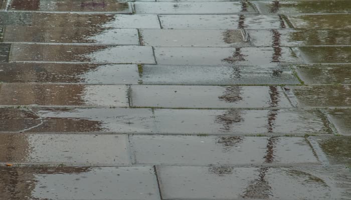 raining on brick pavers