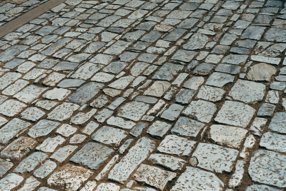 pressure wash pavers with polymeric sand
