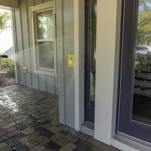 pressure washing professional pressure washing gray home with purple window frames